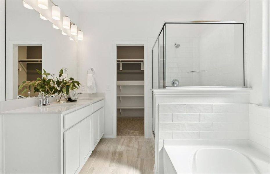 Owner's private bath with double vanity *Model Representation*