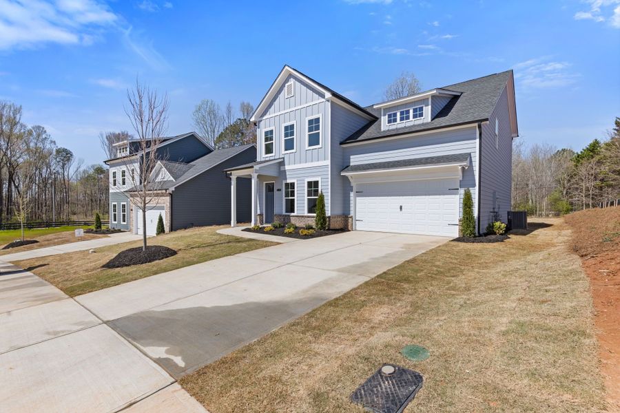 Representative exterior photo of a completed home built from the Stafford by Crawford Creek Communities in Red Bird Manor, Jefferson, GA (Image 24).