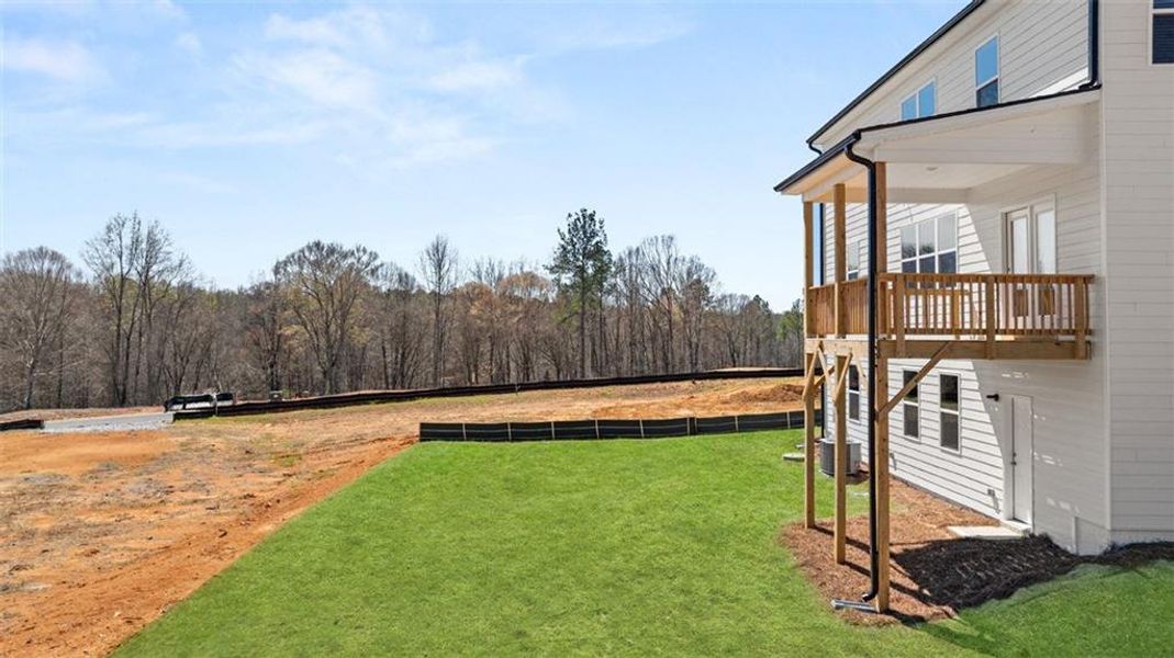 Exterior details and patio area of a home in Kingston Ranch at Lake Oconee, Buckhead (Image 22).