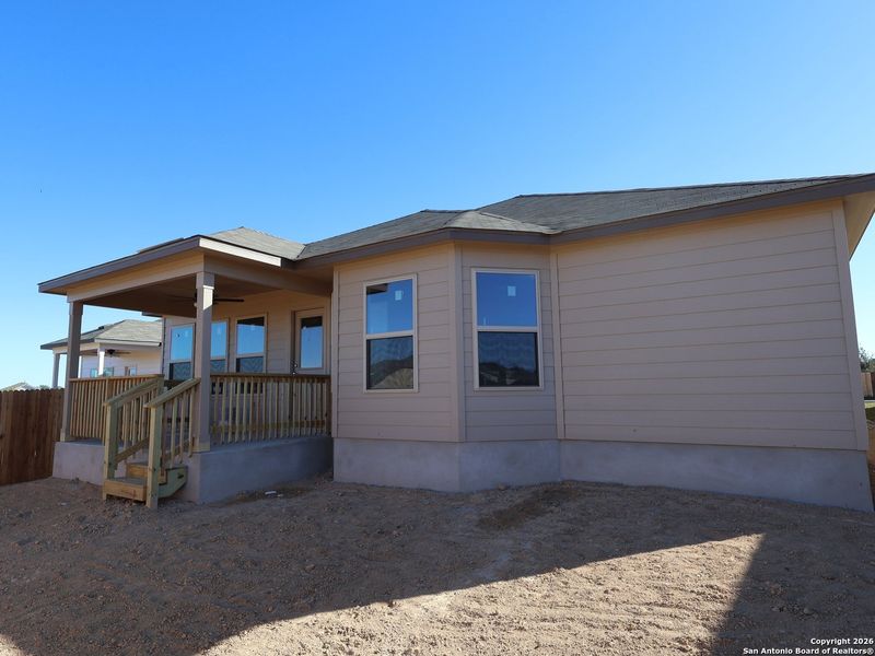 Exterior details and patio area of a home in Winding Brook, San Antonio (Image 3).