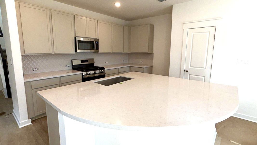 Furnished interior view inside a new home in Flora, Hutto (Image 10).