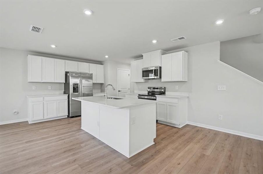 Furnished interior view inside a new home in Sterling Oaks, Ash (Image 3).