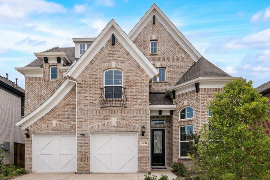 Representative exterior photo of a completed home built from the Grand Martinique by Grand Homes in Providence Cove, McKinney, TX (Image 16). Representative exterior photo of a completed home built from the Grand Martinique by Grand Homes in Providence Cove, McKinney, TX (Image 16).