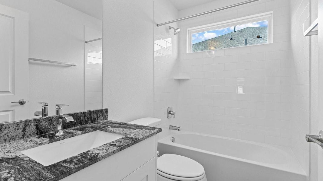 Furnished interior view inside a new home in Harvest Green, Richmond (Image 5).