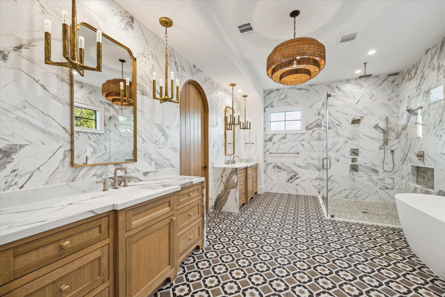 Additional features include walk-in shower, soaking tub, tile run to the ceiling, custom chandelier*Picture is of a recently constructed home by the builder.  1519 Candlelight will be similar in quality, but these pictures are not meant to be an exact representation of the new home. Specs of home may change at sole discretion of the seller.