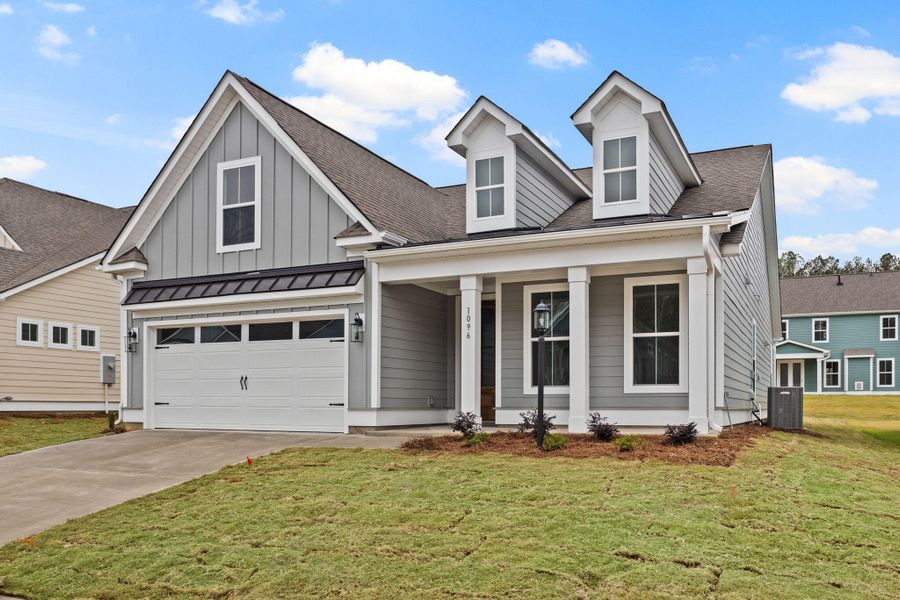 Front exterior of a new home in High Point at Foxbank, Moncks Corner, SC, highlighting curb appeal (Image 18).