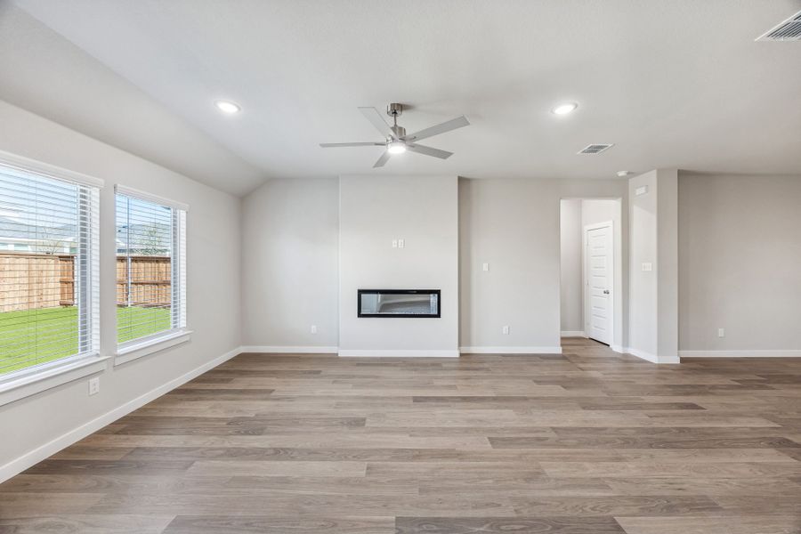 Living Room in the Heisman home plan by Trophy Signature Homes – REPRESENTATIVE PHOTO