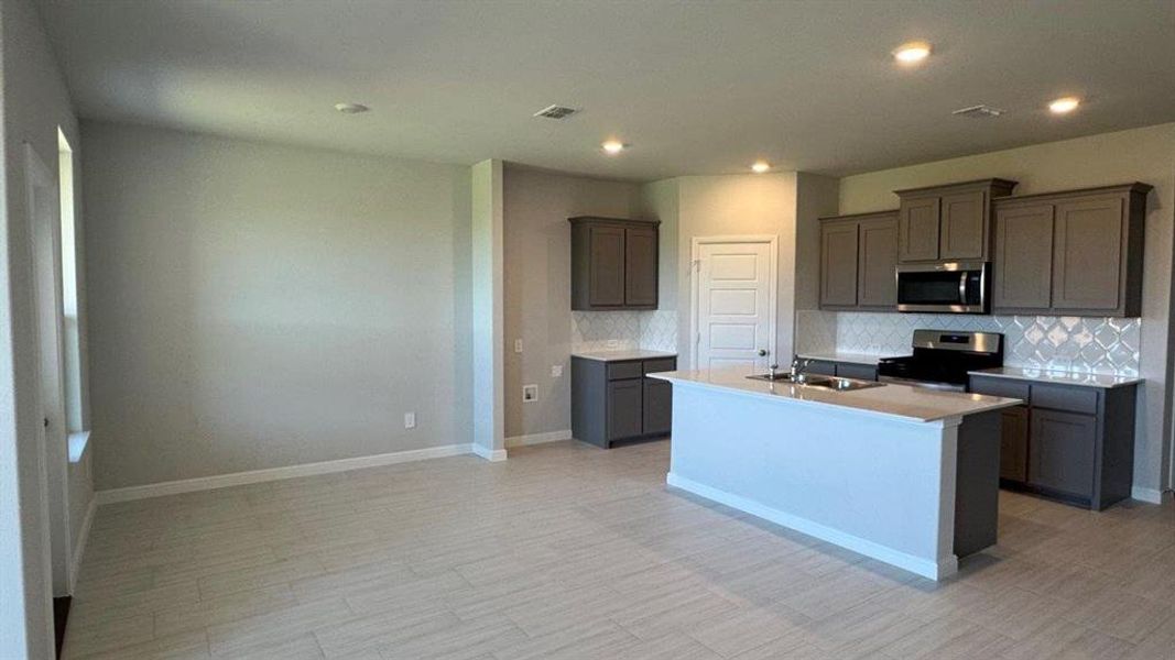 Furnished interior view inside a new home in Monarch at the Meadows, Ponder (Image 6).