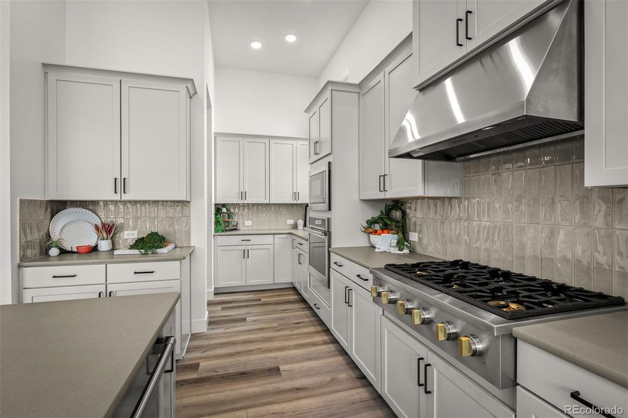 Furnished interior view inside a new home in Cloverleaf - Pinnacle Collection, Monument (Image 29).