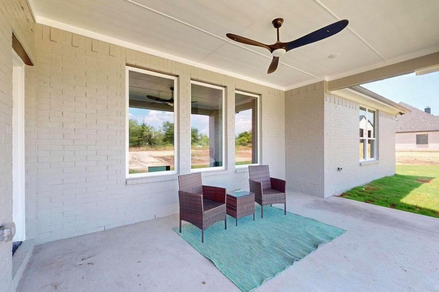 View of patio / terrace featuring ceiling fan