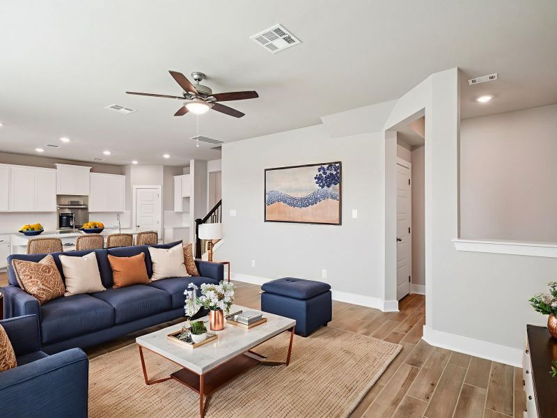 Living room in the Red River floorplan at a Meritage Homes community.