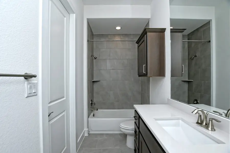 Representative furnished interior of a home built from the Siena III by Giddens Homes in Clearwater Ranch, Liberty Hill (Image 184).