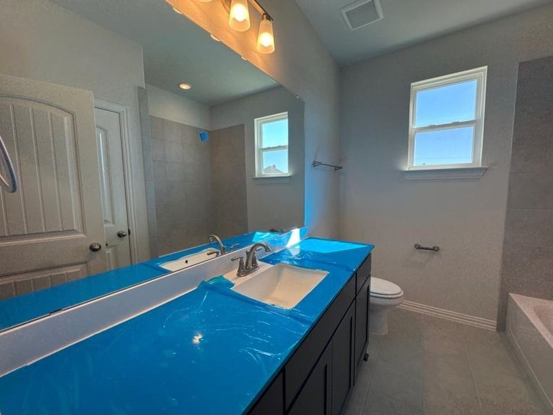 In-progress construction of a new home in Fairview Meadows, New Fairview, TX (Image 18).