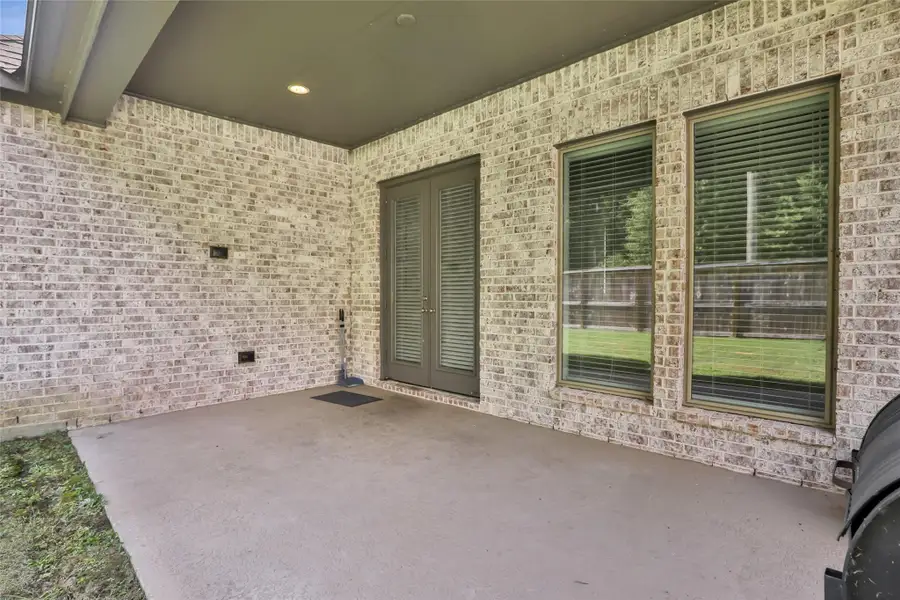Exterior details and patio area of a home in The Highlands, Porter (Image 3).
