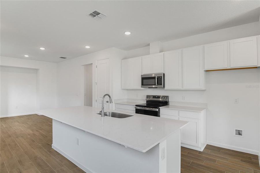 Furnished interior view inside a new home in Seasons at Scenic Terrace, Lake Hamilton (Image 5).