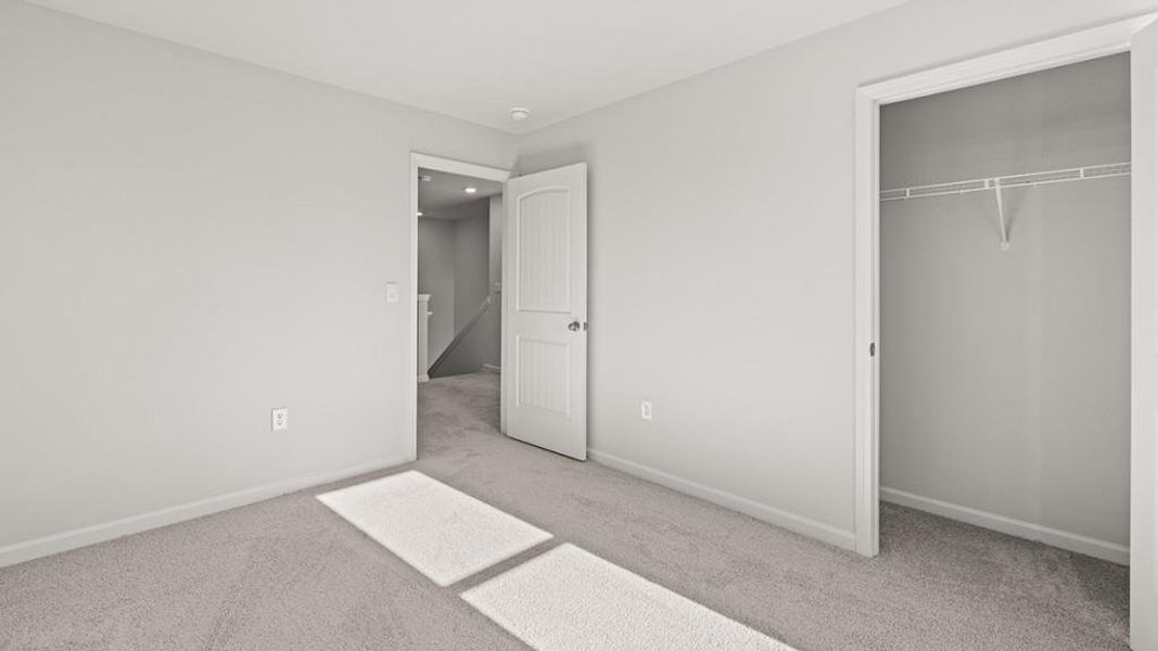 Spacious, unfurnished interior of a new home in Carlton, Douglasville (Image 21).