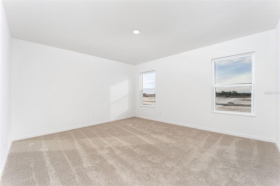 Spacious, unfurnished interior of a new home in Gum Lake Preserve, Lake Alfred (Image 21).