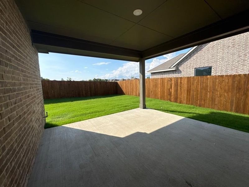 Exterior details and patio area of a home in Cedar Ridge Estates, Anna (Image 3).