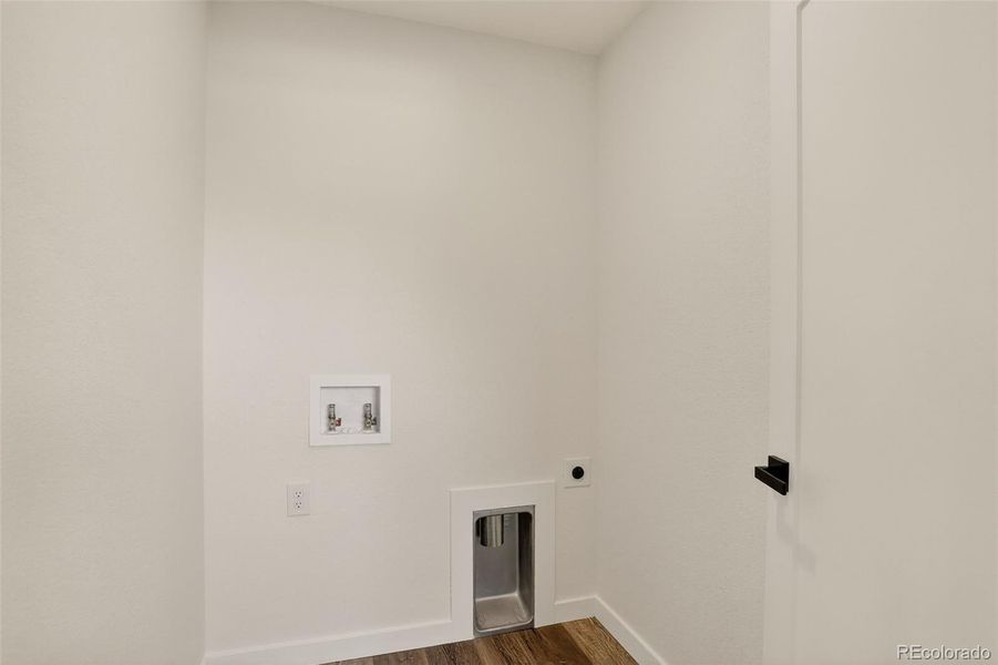 Washer dryer hookup upper level.