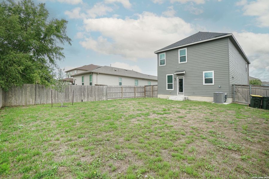 Exterior details and patio area of a home in Parklands, Schertz (Image 22).