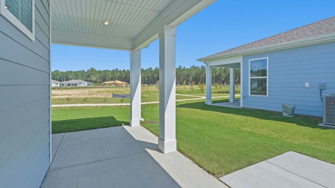 Exterior details and patio area of a home in Sun City Hilton Head, Bluffton (Image 4).