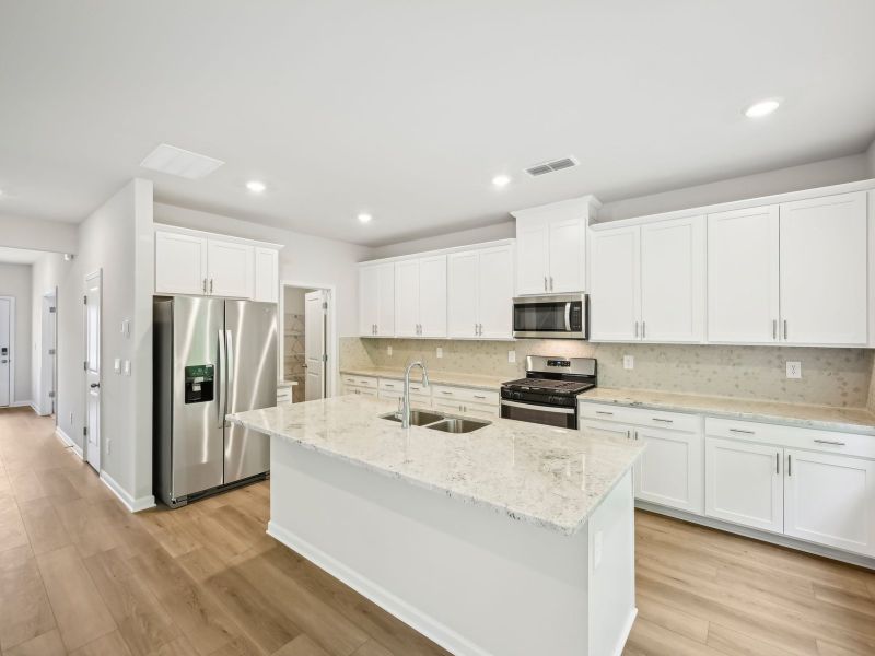 Furnished interior view inside a new home in Martin Springs - Estate Series, Lawrenceville (Image 6).
