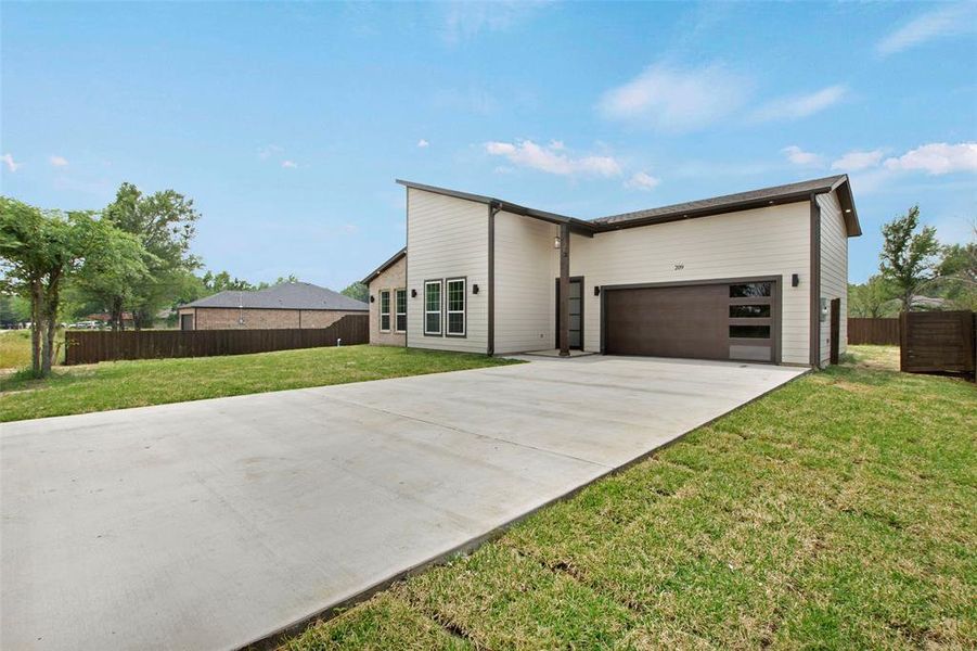Front exterior of a new home in , Tool, TX, highlighting curb appeal (Image 24). Front exterior of a new home in , Tool, TX, highlighting curb appeal (Image 24).