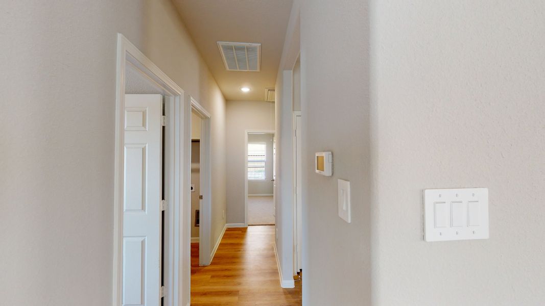 Representative unfurnished interior of a home built from the Floor Plan 1500 by Colina Homes in Cypress Green, Hockley (Image 51).