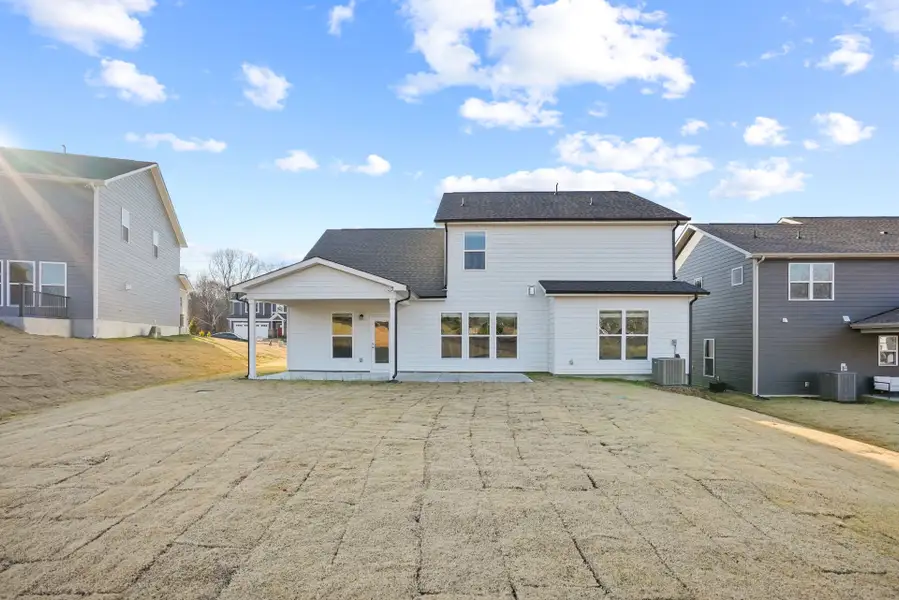 Exterior details and patio area of a home in Forest Creek, Waxhaw (Image 4).