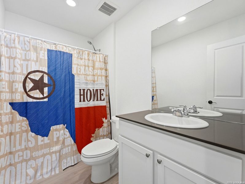 Furnished interior view inside a new home in Torian Village, San Antonio (Image 12).