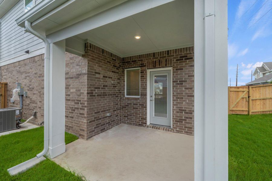 Exterior details and patio area of a home in Meridiana, Manvel (Image 3). Exterior details and patio area of a home in Meridiana, Manvel (Image 3).