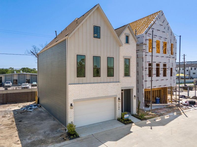 Front exterior of a new home in Spring Valley Creek, Houston, TX, highlighting curb appeal (Image 22).