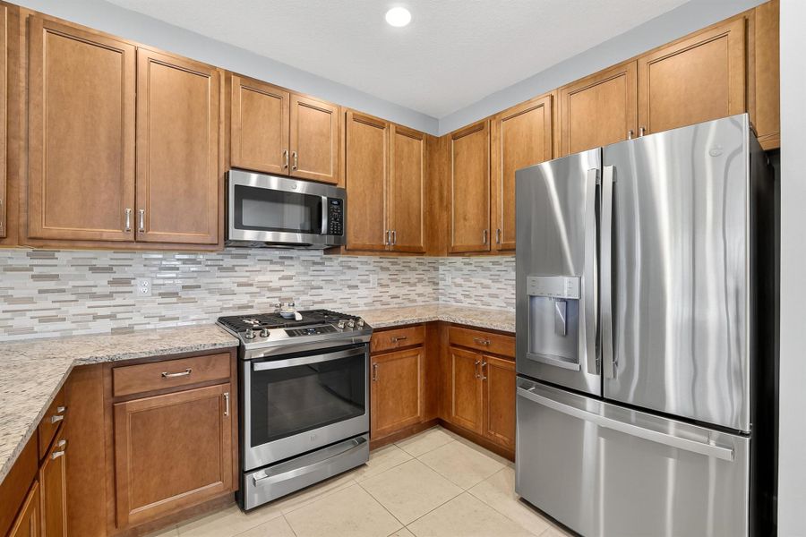 Furnished interior view inside a new home in , Port St. Lucie (Image 24).