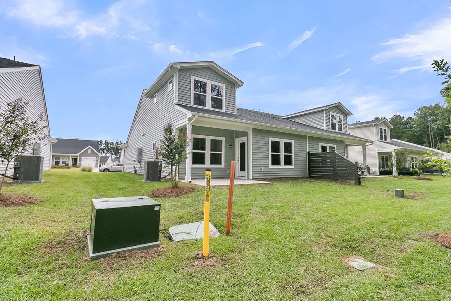 Exterior details and patio area of a home in Hammock Walk at Nexton, Summerville (Image 3). Exterior details and patio area of a home in Hammock Walk at Nexton, Summerville (Image 3).