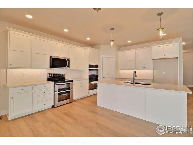 Furnished interior view inside a new home in , Evans (Image 10).
