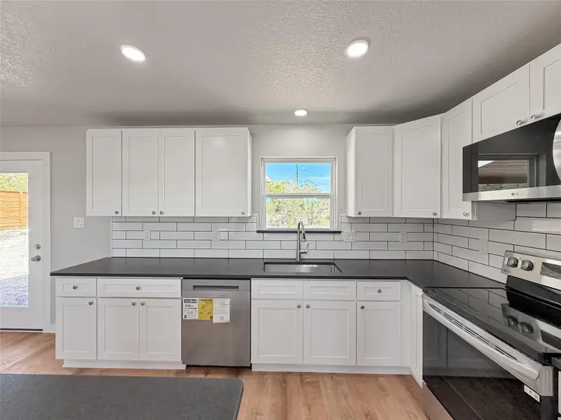 Furnished interior view inside a new home in , Spring Branch (Image 9).