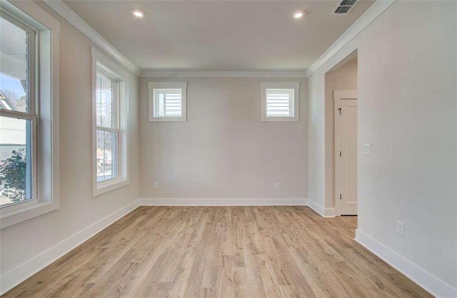 Spacious, unfurnished interior of a new home in The Paddocks at Doc Hughes, Buford (Image 23).