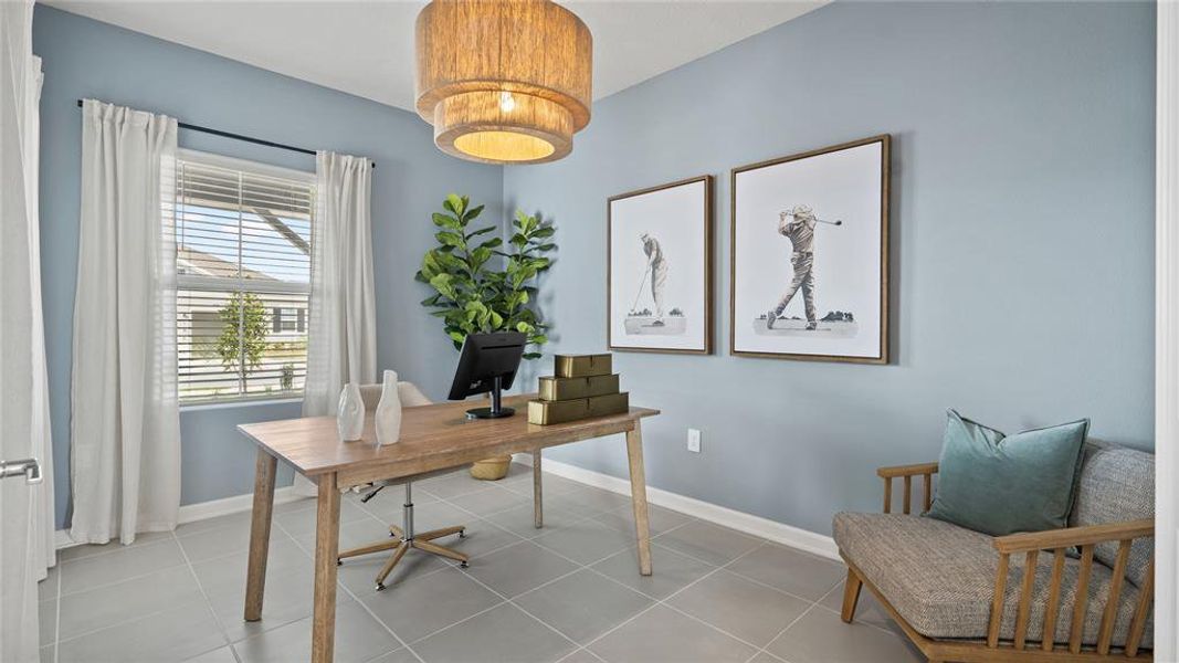 Office space featuring baseboards and light tile patterned floors Office space featuring baseboards and light tile patterned floors