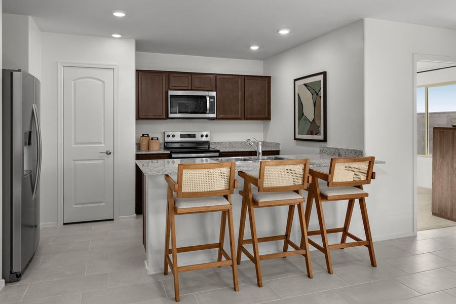 Representative furnished interior of a home built from the 1383 Modeled by KB Home in Mirador Ridge Blossom, Tucson (Image 4).