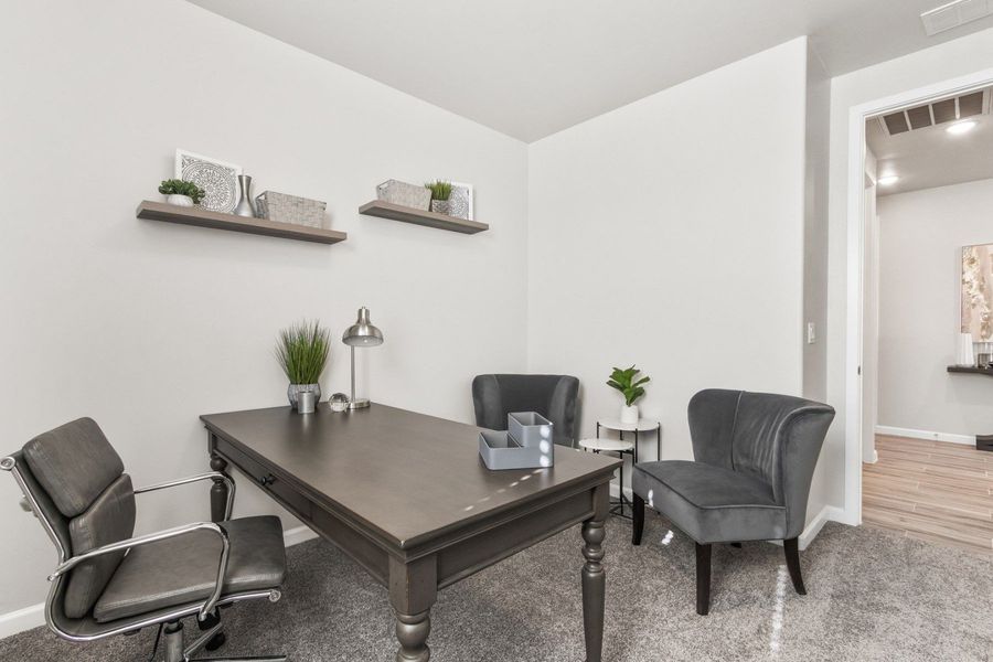 Representative furnished interior of a home built from the Valencia by Hakes Brothers in Hillside Park, El Paso (Image 39).