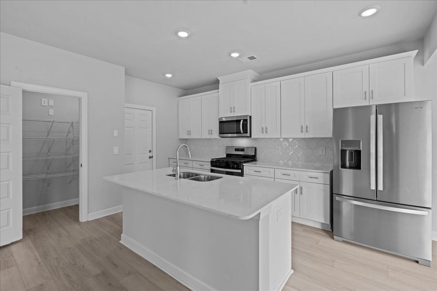Furnished interior view inside a new home in Brayfield Manor - Heritage Collection, Wellford (Image 4).