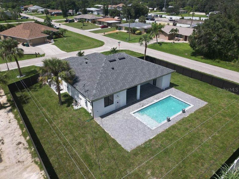 Front exterior of a new home in , Port Charlotte, FL, highlighting curb appeal (Image 2).