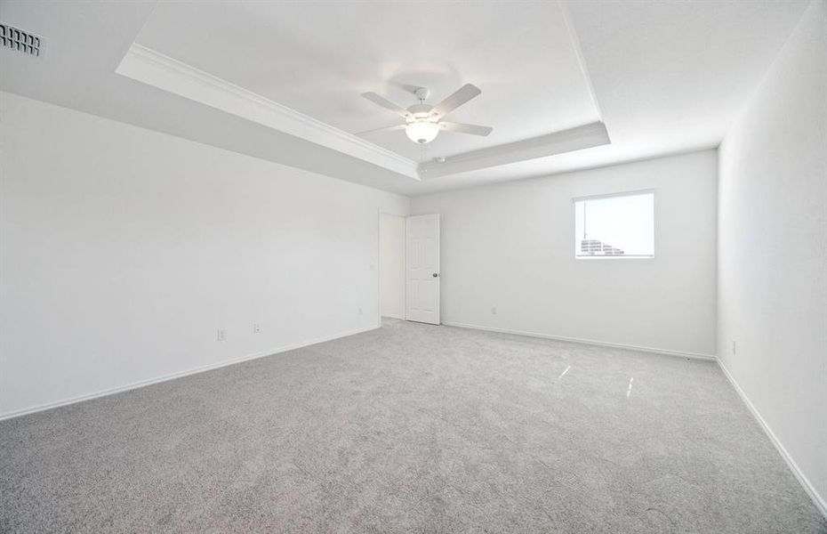Spacious owner's suite highlighted by an exquisite tray ceiling Spacious owner's suite highlighted by an exquisite tray ceiling