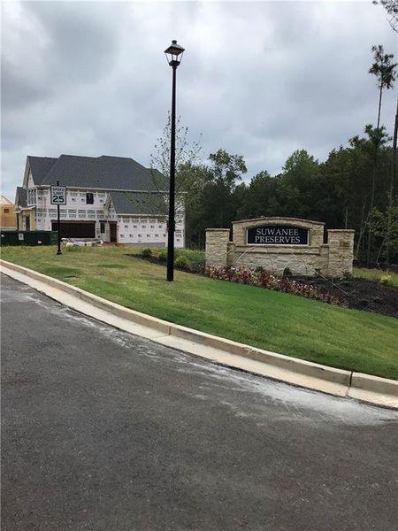 Front exterior of a new home in , Cumming, GA, highlighting curb appeal (Image 20).