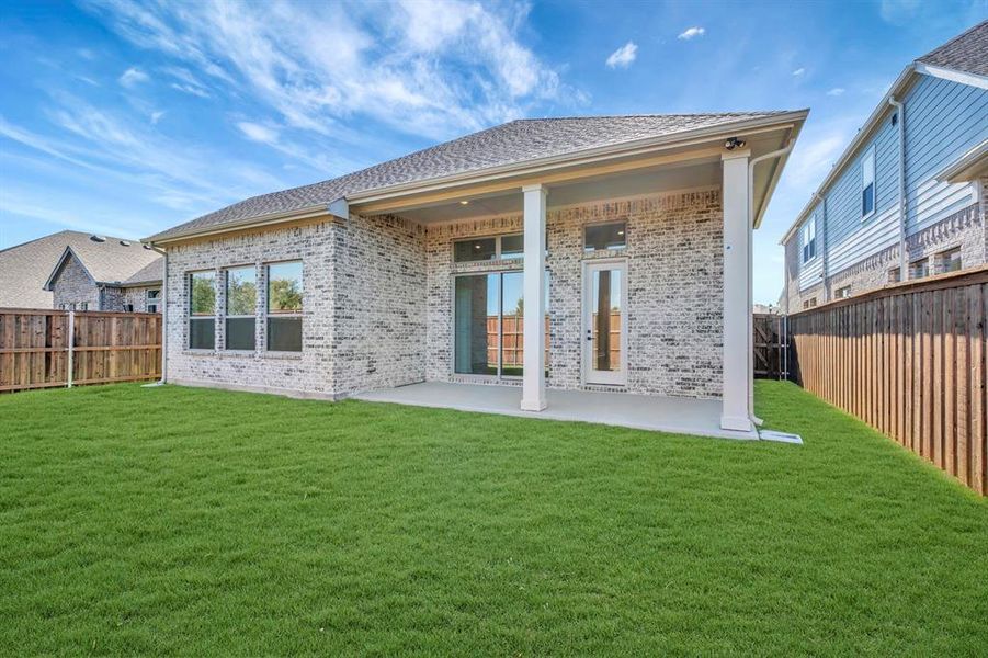 Exterior details and patio area of a home in South Pointe Cottage Series, Mansfield (Image 2). Exterior details and patio area of a home in South Pointe Cottage Series, Mansfield (Image 2).