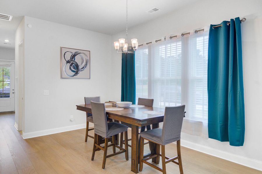 Furnished interior view inside a new home in Limehouse Village: Row Collection, Summerville (Image 14).