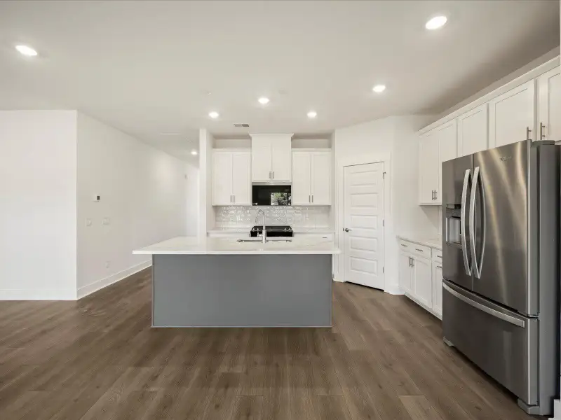 Furnished interior view inside a new home in The Coves at Lakes of Cane Bay, Summerville (Image 7).