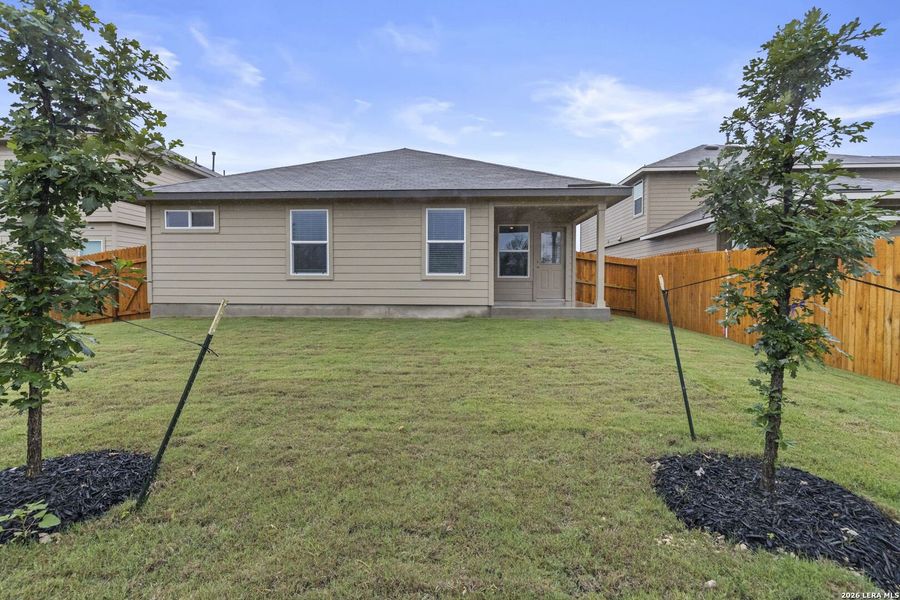 Exterior details and patio area of a home in Riverstone at Westpointe, San Antonio (Image 2).