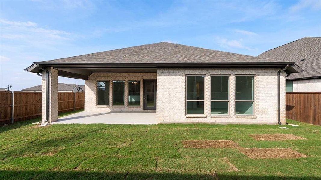 Exterior details and patio area of a home in Devonshire - Reserve 45', Forney (Image 4). Exterior details and patio area of a home in Devonshire - Reserve 45', Forney (Image 4).