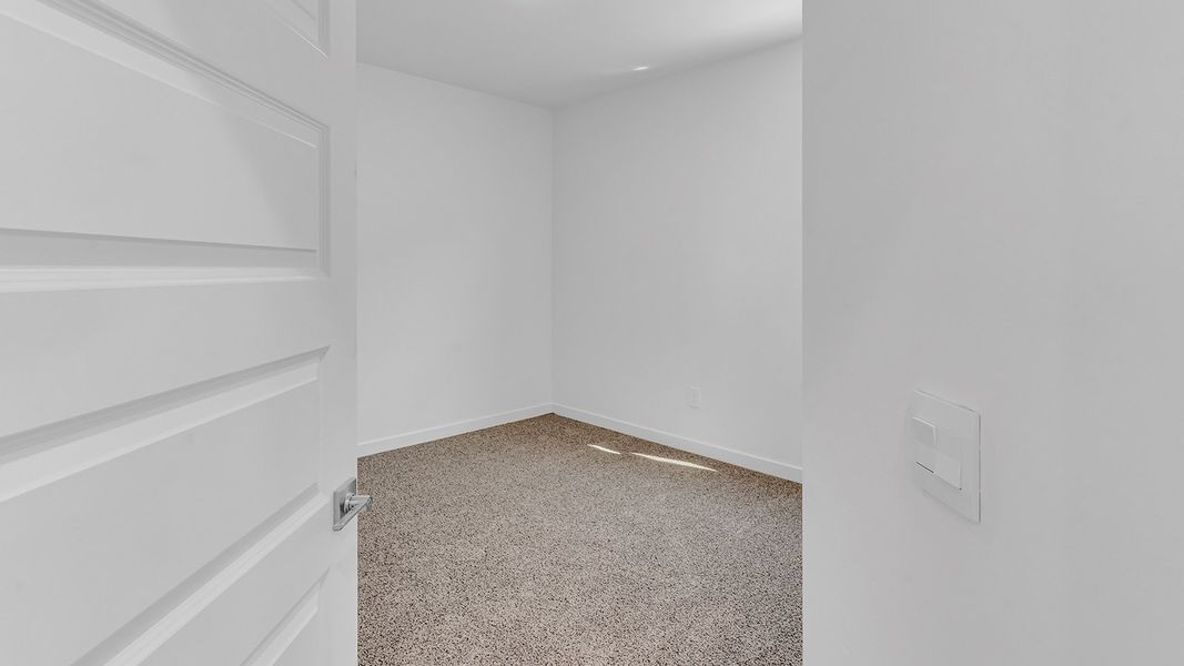Representative unfurnished interior of a home built from the Parker by D.R. Horton in The Oasis at Rocking K, Vail (Image 31).